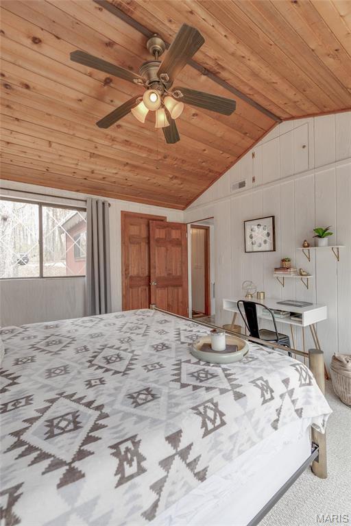 628 W St Gallen Dr, Innsbrook, MO 63390 - bedroom with lofted ceiling, wood ceiling, carpet flooring, and a ceiling fan