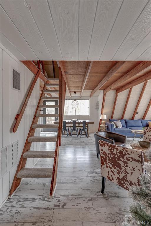 628 W St Gallen Dr, Innsbrook, MO 63390 - stairway with hardwood / wood-style flooring and wooden ceiling