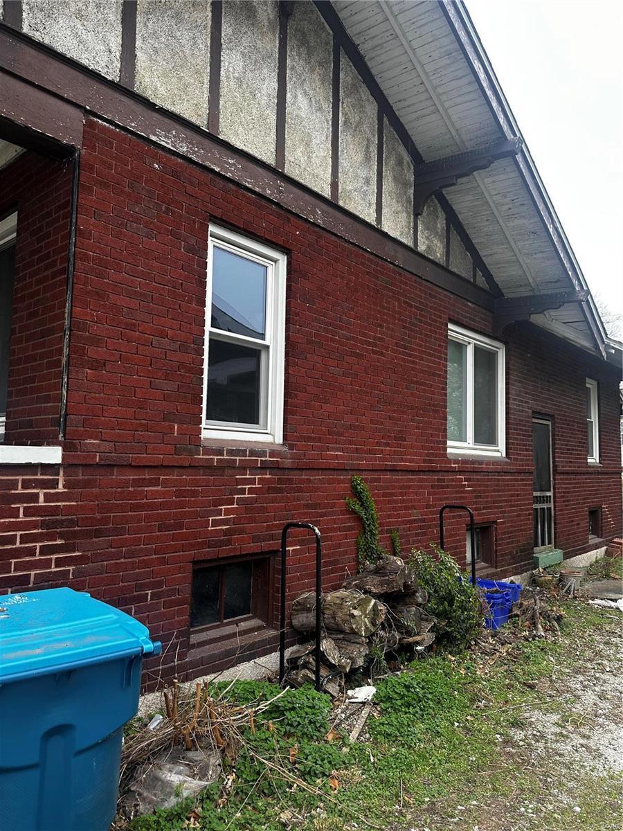 830 N Wood River Ave, Wood River, IL 62095 - view of side of property with brick siding