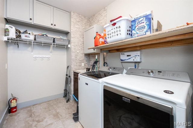 7032 Koufax Ct, Edwardsville, IL 62025 - washroom featuring cabinet space, washing machine and dryer, and baseboards