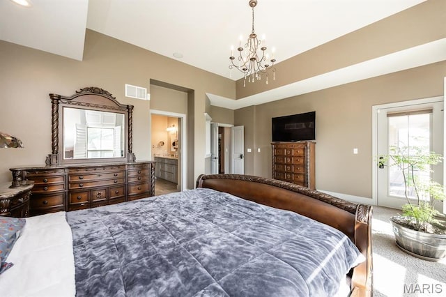7032 Koufax Ct, Edwardsville, IL 62025 - carpeted bedroom with a chandelier, access to exterior, and ensuite bathroom