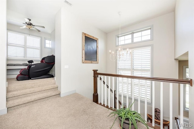 7032 Koufax Ct, Edwardsville, IL 62025 - hall with carpet floors, a chandelier, and an upstairs landing
