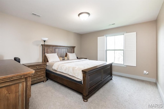 7032 Koufax Ct, Edwardsville, IL 62025 - bedroom featuring light colored carpet and baseboards