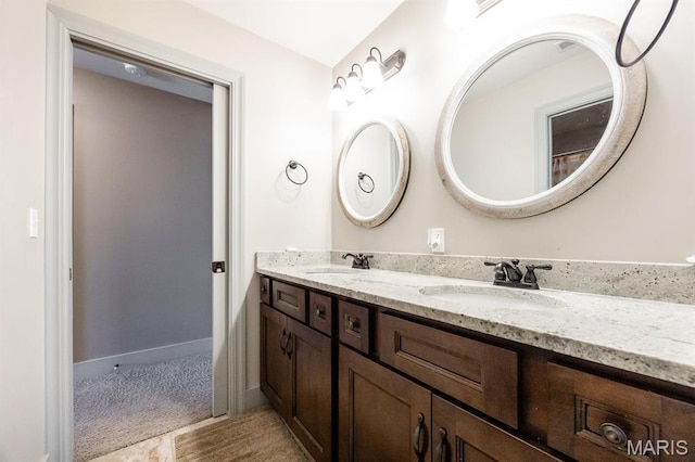 7032 Koufax Ct, Edwardsville, IL 62025 - bathroom featuring double vanity and tile patterned floors