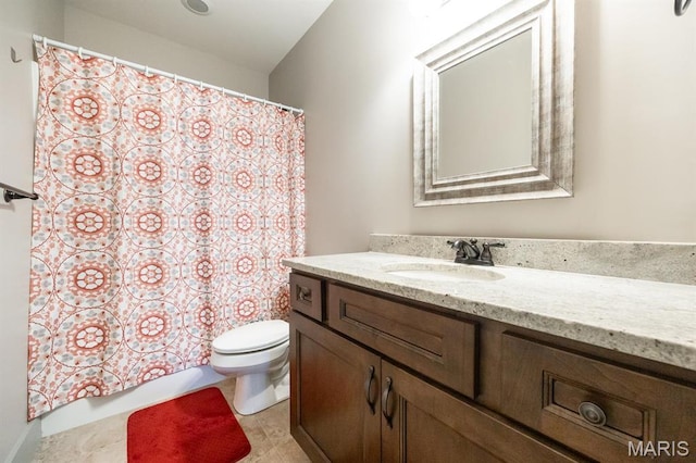 7032 Koufax Ct, Edwardsville, IL 62025 - full bathroom featuring toilet, vanity, a shower with shower curtain, and tile patterned floors