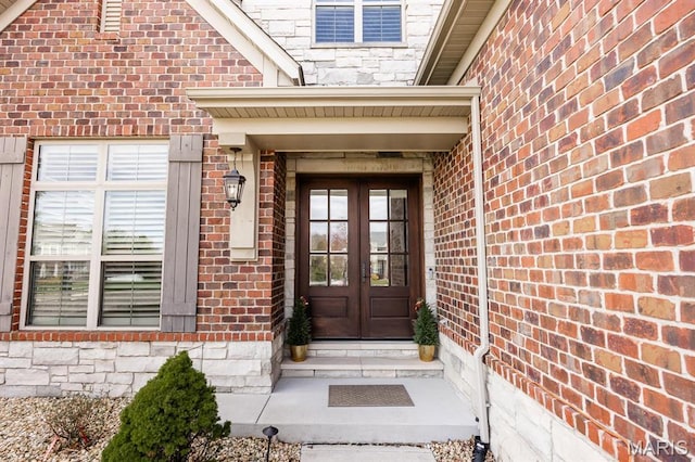 7032 Koufax Ct, Edwardsville, IL 62025 - doorway to property featuring french doors and brick siding