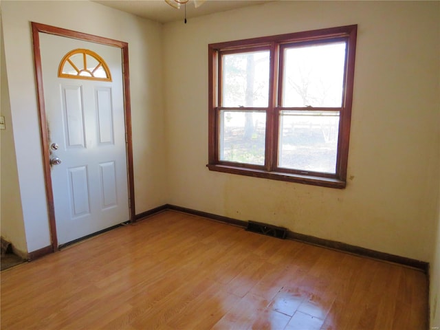 8 Indian Hills Dr, Cuba, MO 65453 - entryway featuring light wood finished floors and baseboards