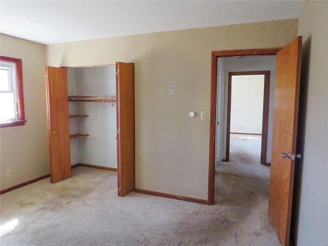 8 Indian Hills Dr, Cuba, MO 65453 - unfurnished bedroom featuring light colored carpet, a closet, and baseboards