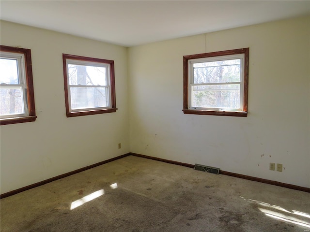 8 Indian Hills Dr, Cuba, MO 65453 - carpeted empty room with baseboards