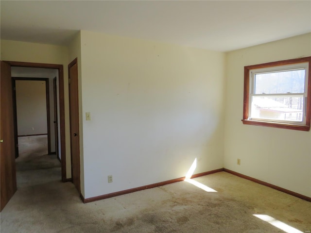 8 Indian Hills Dr, Cuba, MO 65453 - unfurnished room featuring light carpet and baseboards