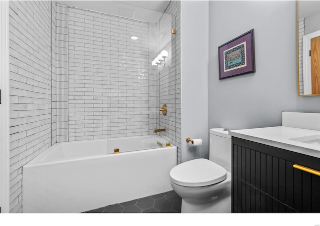 7825 Lafon Pl, Saint Louis, MO 63130 - bathroom with toilet, tile patterned floors, tub / shower combination, and vanity