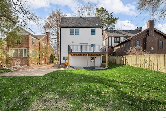 7825 Lafon Pl, Saint Louis, MO 63130 - back of house with a patio and a wooden deck