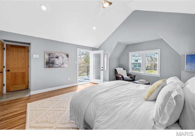 7825 Lafon Pl, Saint Louis, MO 63130 - bedroom with access to exterior, vaulted ceiling, light wood-style flooring, baseboards, and recessed lighting