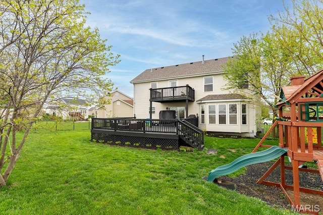 6833 Brandywine Ct, Fairview Heights, IL 62208 - back of property featuring a playground, a wooden deck, and roof with shingles