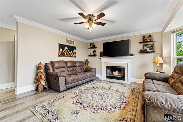 6833 Brandywine Ct, Fairview Heights, IL 62208 - living room featuring wood finished floors, a ceiling fan, ornamental molding, baseboards, and a fireplace with flush hearth
