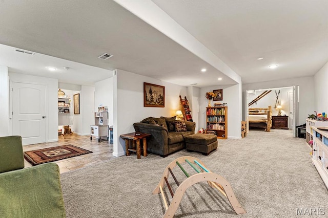 6833 Brandywine Ct, Fairview Heights, IL 62208 - living room featuring recessed lighting, baseboards, and carpet