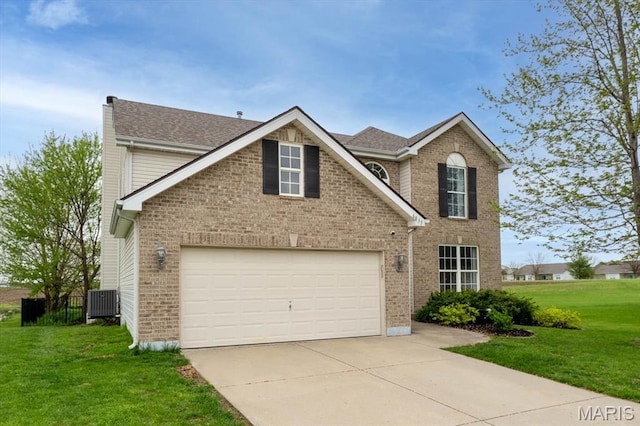6833 Brandywine Ct, Fairview Heights, IL 62208 - traditional-style house featuring driveway, a front yard, brick siding, and central air condition unit