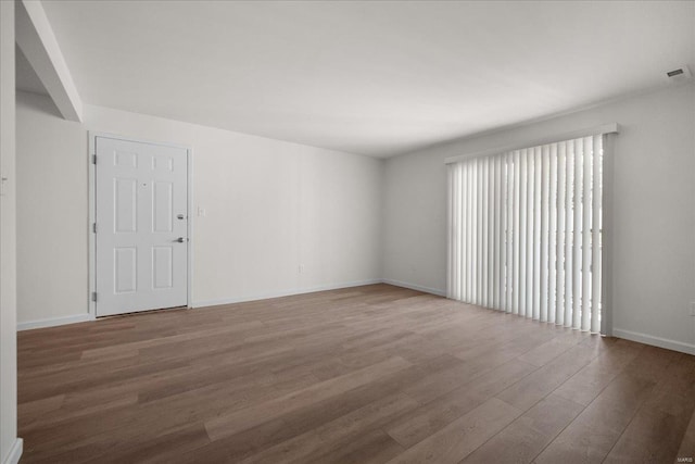 7600 Triwoods Dr Unit G, Saint Louis, MO 63119 - spare room with wood finished floors and baseboards