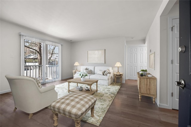 7600 Triwoods Dr Unit G, Saint Louis, MO 63119 - living room featuring baseboards and dark wood-style floors