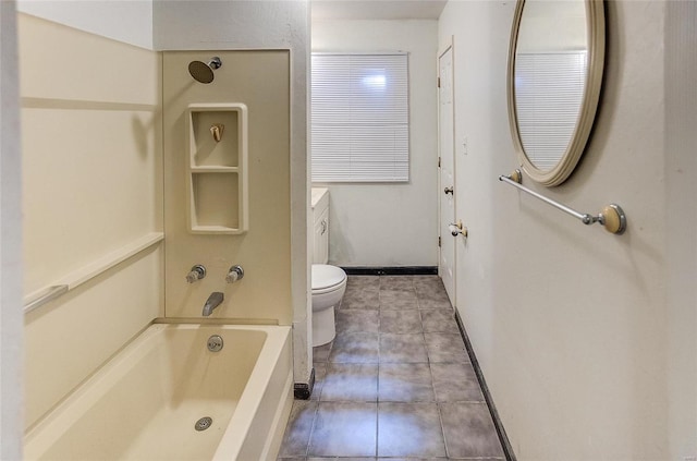 bathroom with toilet, tile patterned floors, and shower / bathtub combination