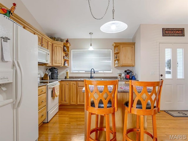 105 Megan Ct, Valmeyer, IL 62295 - kitchen with white appliances, open shelves, light wood-type flooring, a kitchen island, and plenty of natural light