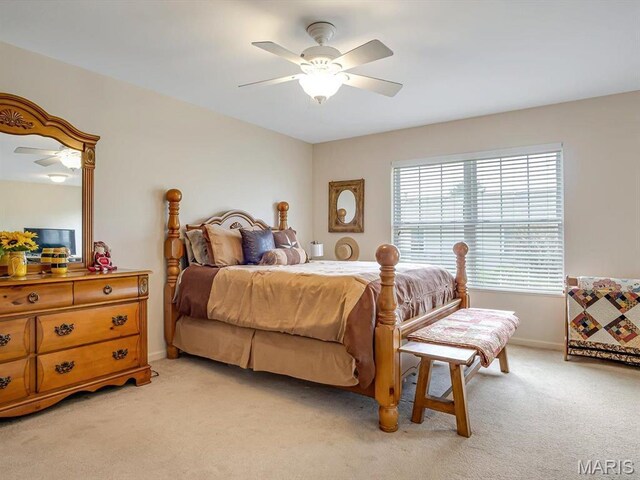 105 Megan Ct, Valmeyer, IL 62295 - bedroom featuring light carpet, baseboards, and a ceiling fan