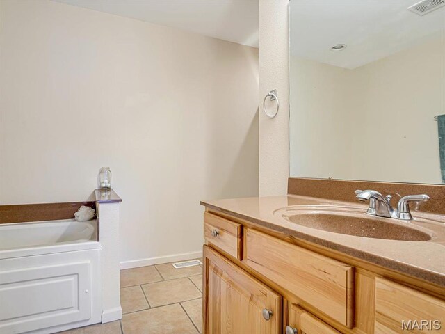 105 Megan Ct, Valmeyer, IL 62295 - full bath with tile patterned flooring, a bath, and vanity