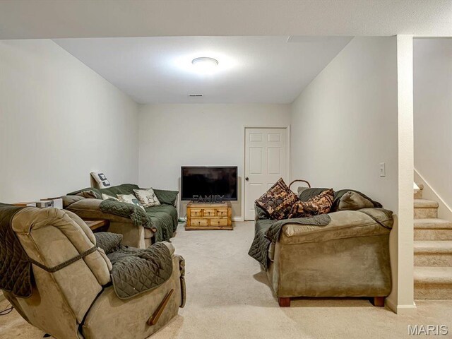 105 Megan Ct, Valmeyer, IL 62295 - living room featuring light colored carpet and stairway