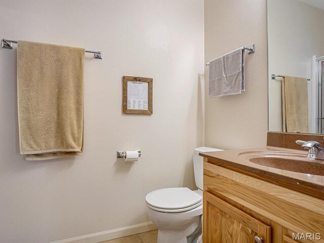 105 Megan Ct, Valmeyer, IL 62295 - bathroom with toilet, vanity, and baseboards
