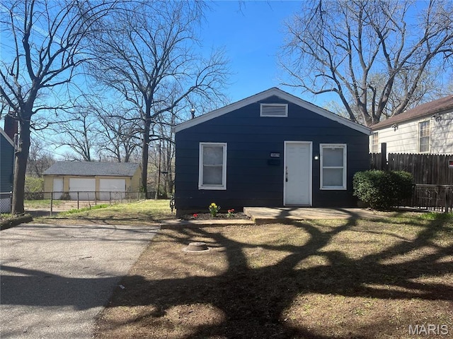 10029 Count Dr, Saint Louis, MO 63136 - view of outbuilding featuring fence and an outbuilding