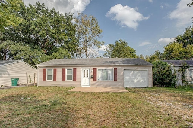 view of front facade featuring a garage and a front yard