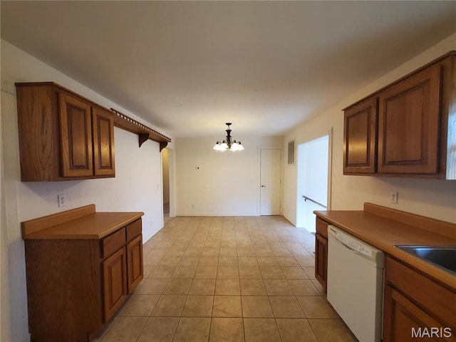 528 Dogwood Ln, Houston, MO 65483 - kitchen featuring white dishwasher, a chandelier, brown cabinets, light tile patterned flooring, and decorative light fixtures