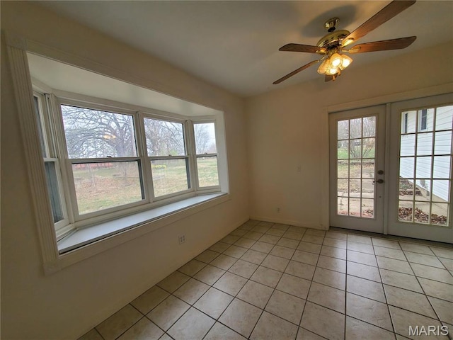 528 Dogwood Ln, Houston, MO 65483 - empty room featuring french doors, light tile patterned floors, and ceiling fan