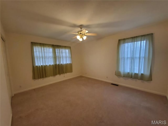 528 Dogwood Ln, Houston, MO 65483 - spare room with baseboards, carpet floors, and ceiling fan