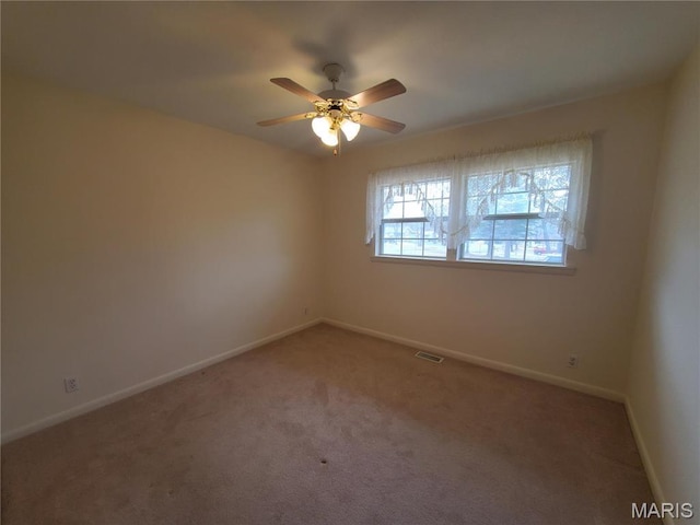 528 Dogwood Ln, Houston, MO 65483 - unfurnished room with carpet floors, baseboards, and ceiling fan