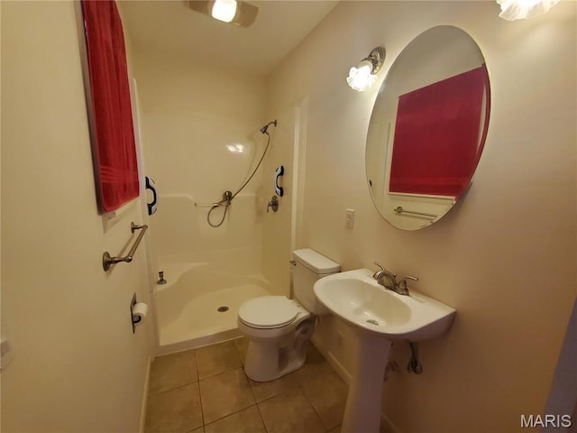 528 Dogwood Ln, Houston, MO 65483 - full bath with toilet, a stall shower, tile patterned flooring, and a sink
