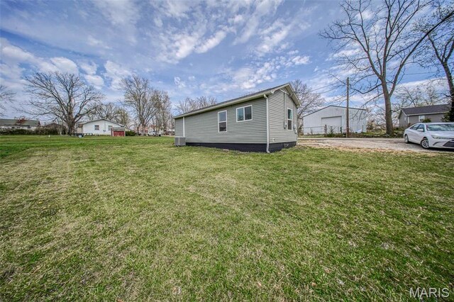 713 N Oak St, Salem, MO 65560 - view of home's exterior featuring a yard, an outbuilding, and cooling unit
