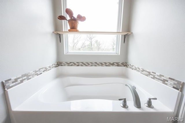 full bath with a garden tub