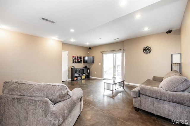 living area featuring concrete floors, recessed lighting, and baseboards