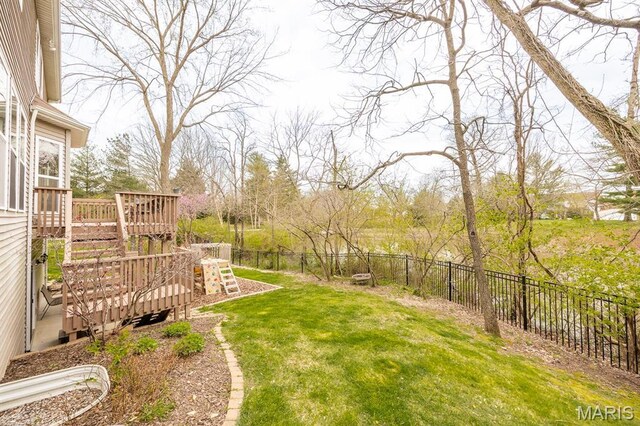 view of yard with a deck