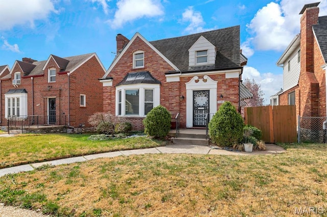 view of front of home featuring brick siding
