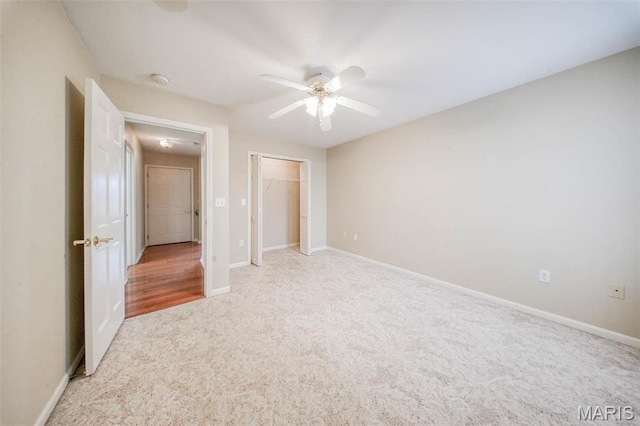 1106 Grandsir Ave, Rolla, MO 65401 - unfurnished bedroom with carpet floors, baseboards, a closet, and a ceiling fan