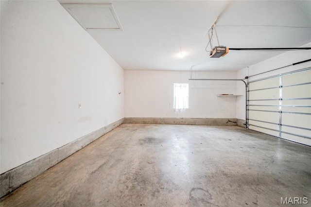 1106 Grandsir Ave, Rolla, MO 65401 - garage featuring a garage door opener