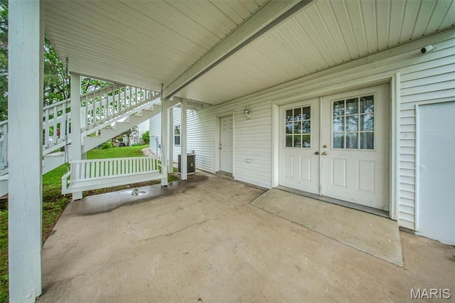 1106 Grandsir Ave, Rolla, MO 65401 - view of patio featuring stairway and cooling unit