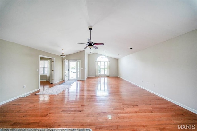 1106 Grandsir Ave, Rolla, MO 65401 - unfurnished living room featuring vaulted ceiling, light wood-type flooring, a ceiling fan, and baseboards