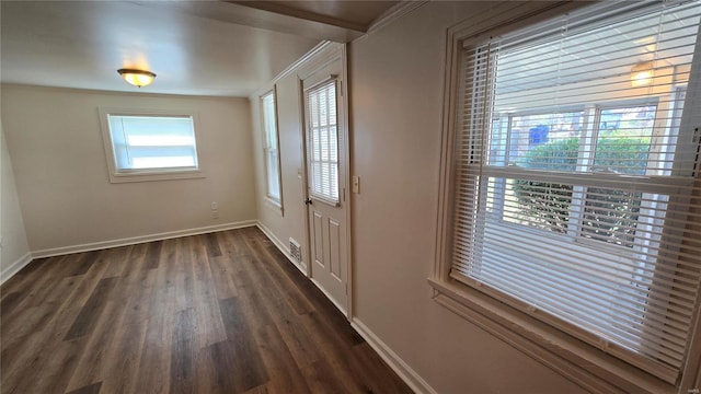 3240 Airway Ave, Saint Louis, MO 63114 - doorway to outside with dark wood-style floors and baseboards