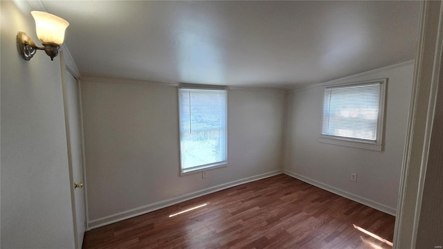3240 Airway Ave, Saint Louis, MO 63114 - unfurnished room featuring plenty of natural light, wood finished floors, baseboards, and lofted ceiling