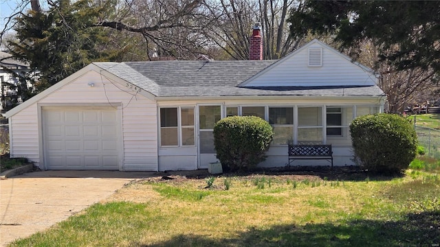 3240 Airway Ave, Saint Louis, MO 63114 - view of front of property with a shingled roof, concrete driveway, a chimney, a garage, and a front yard