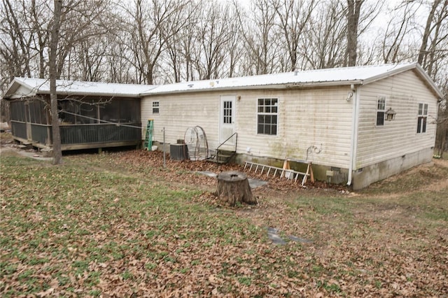 25125 Ash Dr, Grovespring, MO 65662 - back of property with crawl space, a sunroom, metal roof, and cooling unit