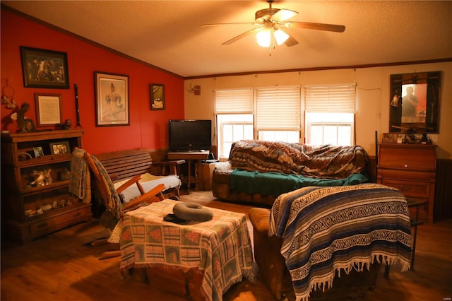25125 Ash Dr, Grovespring, MO 65662 - living room with crown molding, vaulted ceiling, a ceiling fan, and wood finished floors